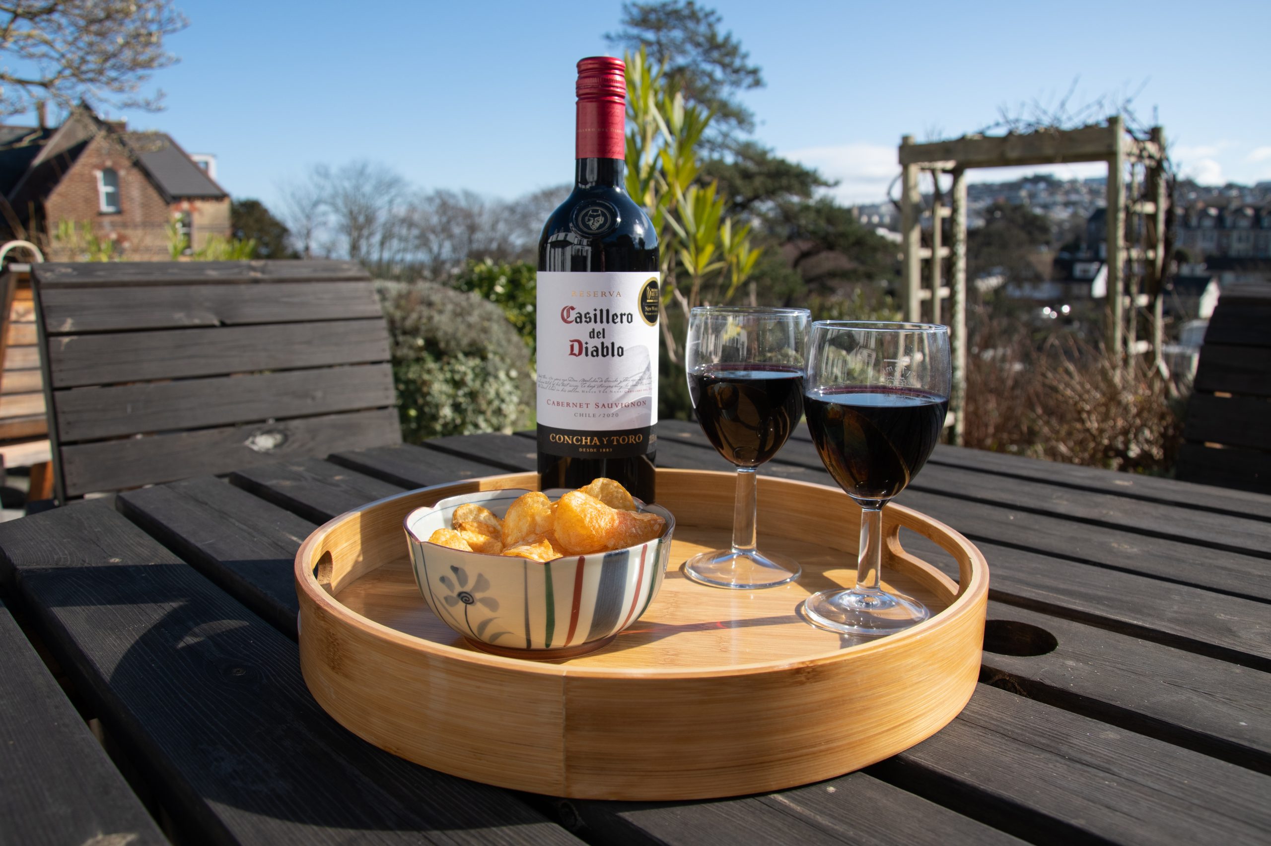 Wine on table in garden Epchris Guest House Ilfracombe North Devon